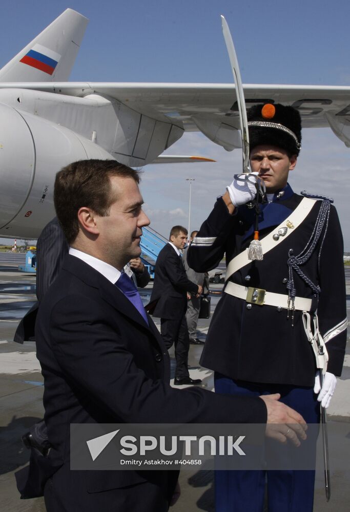 Dmitry Medvedev and his wife arrive in the Netherlands