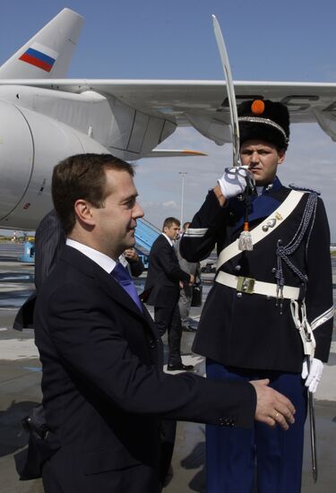 Dmitry Medvedev and his wife arrive in the Netherlands