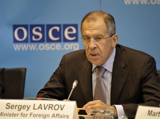 Sergei Lavrov at a news conference in Vienna