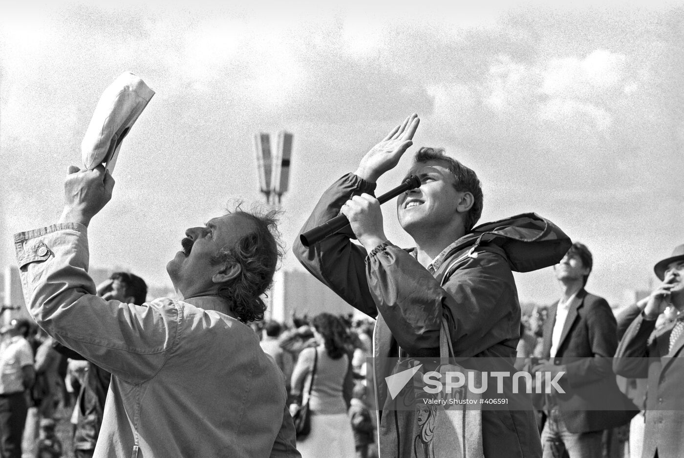 Air sport fans watch sky divers