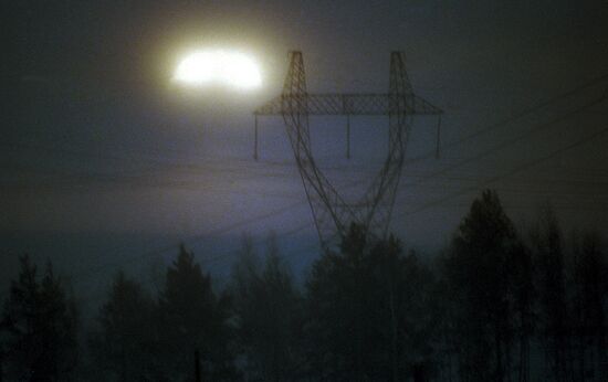 Power transmission line at night