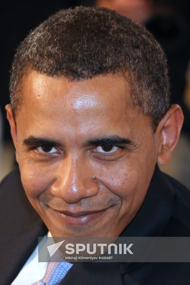 Barack Obama attends 2009 G8 summit