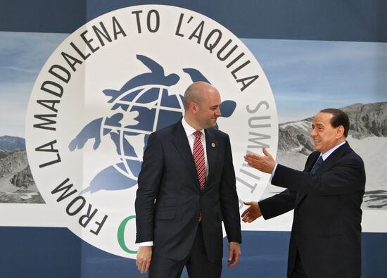 Fredrik Reinfeldt, Silvio Berlusconi attend 2009 G8 summit