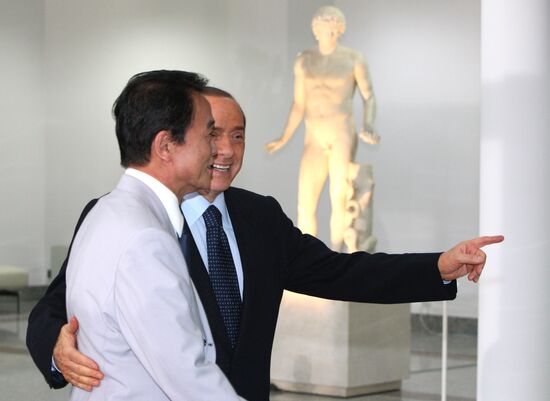 Taro Aso, Silvio Berlusconi attend 2009 G8 summit