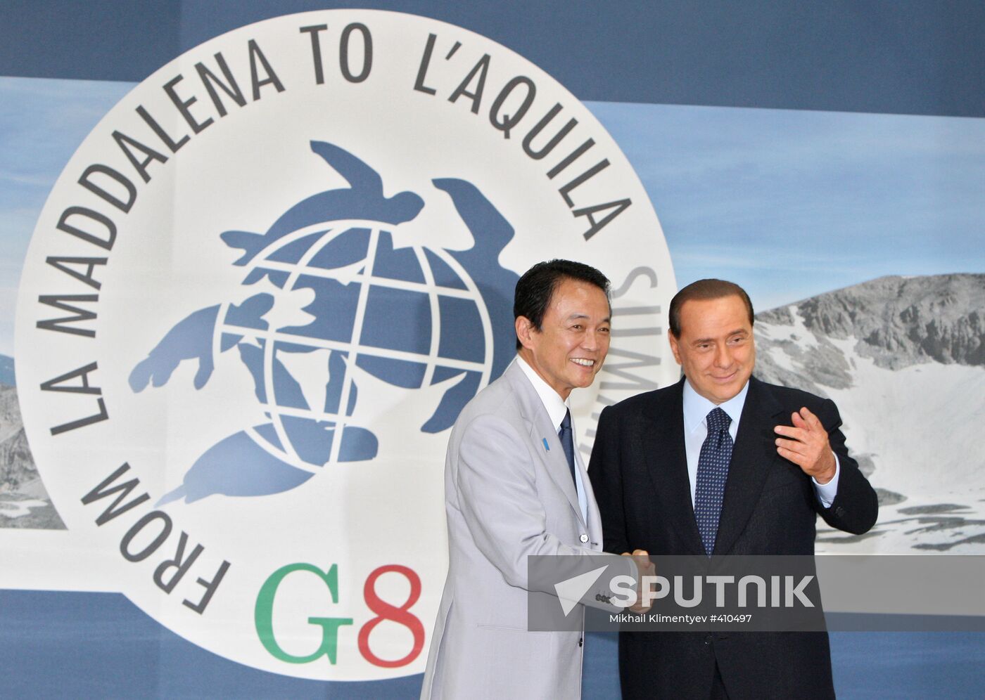 Taro Aso, Silvio Berlusconi attend 2009 G8 summit