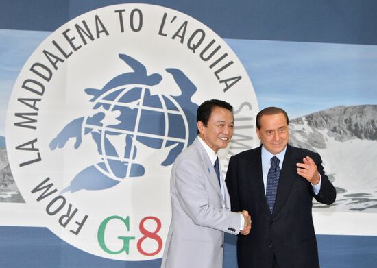 Taro Aso, Silvio Berlusconi attend 2009 G8 summit