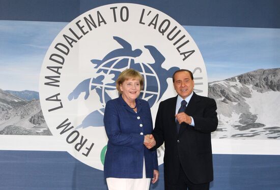Angela Merkel, Silvio Berlusconi attend 2009 G8 summit