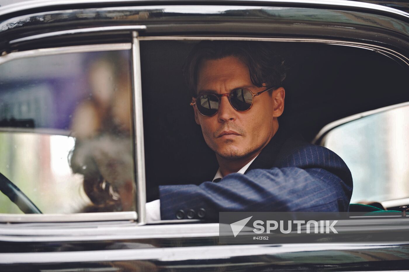 Johnny Depp starring in Public Enemies