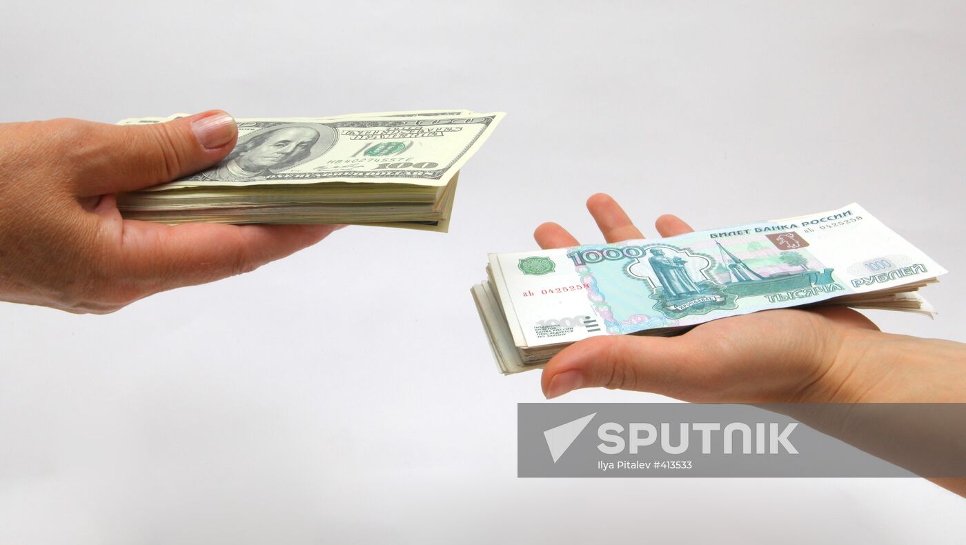 Ruble and dollar banknotes