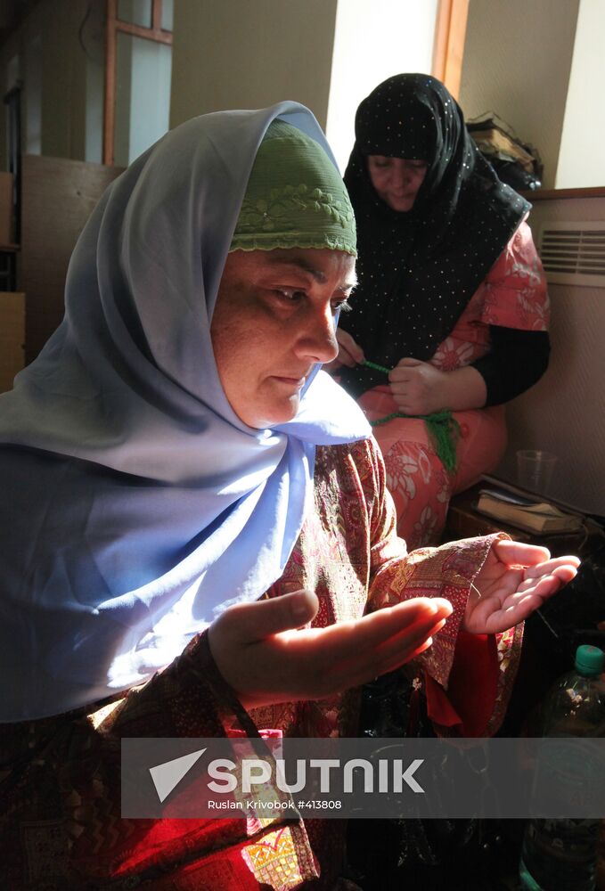Muslim believers perform prayer at Moscow Congregational Mosque
