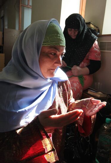 Muslim believers perform prayer at Moscow Congregational Mosque
