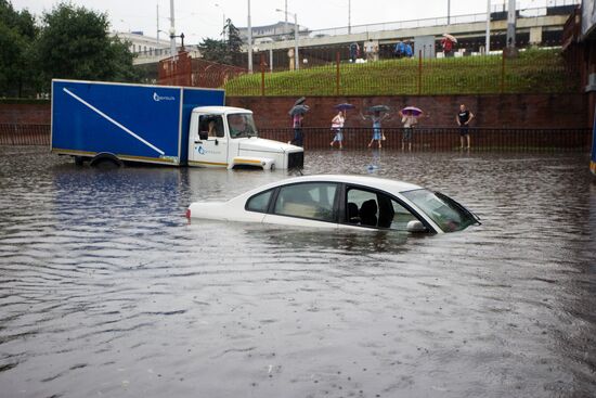 Heavy rain floods streets of Minsk