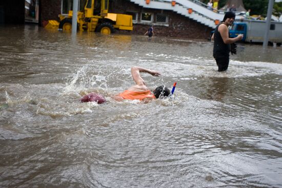 Heavy rain floods streets of Minsk