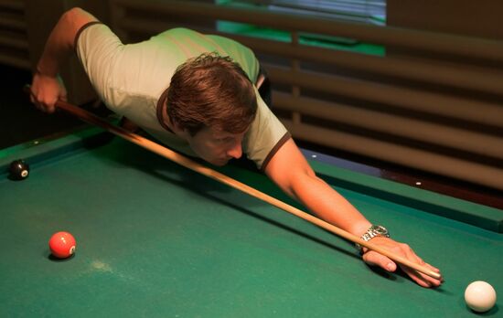 Playing billiards