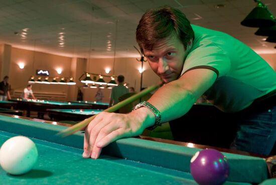 Playing billiards