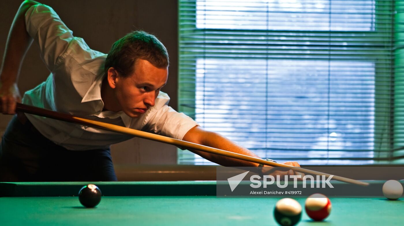 Playing billiards