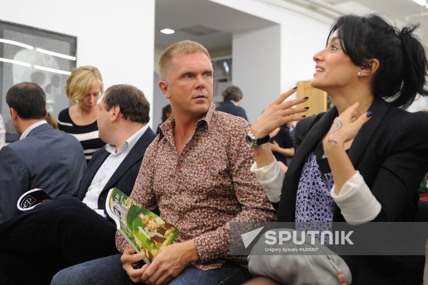 Andrei Kolesnikov and Tina Kandelaki attending Pioneer Readings