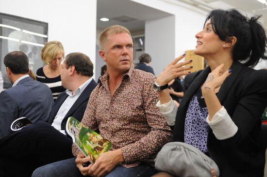 Andrei Kolesnikov and Tina Kandelaki attending Pioneer Readings