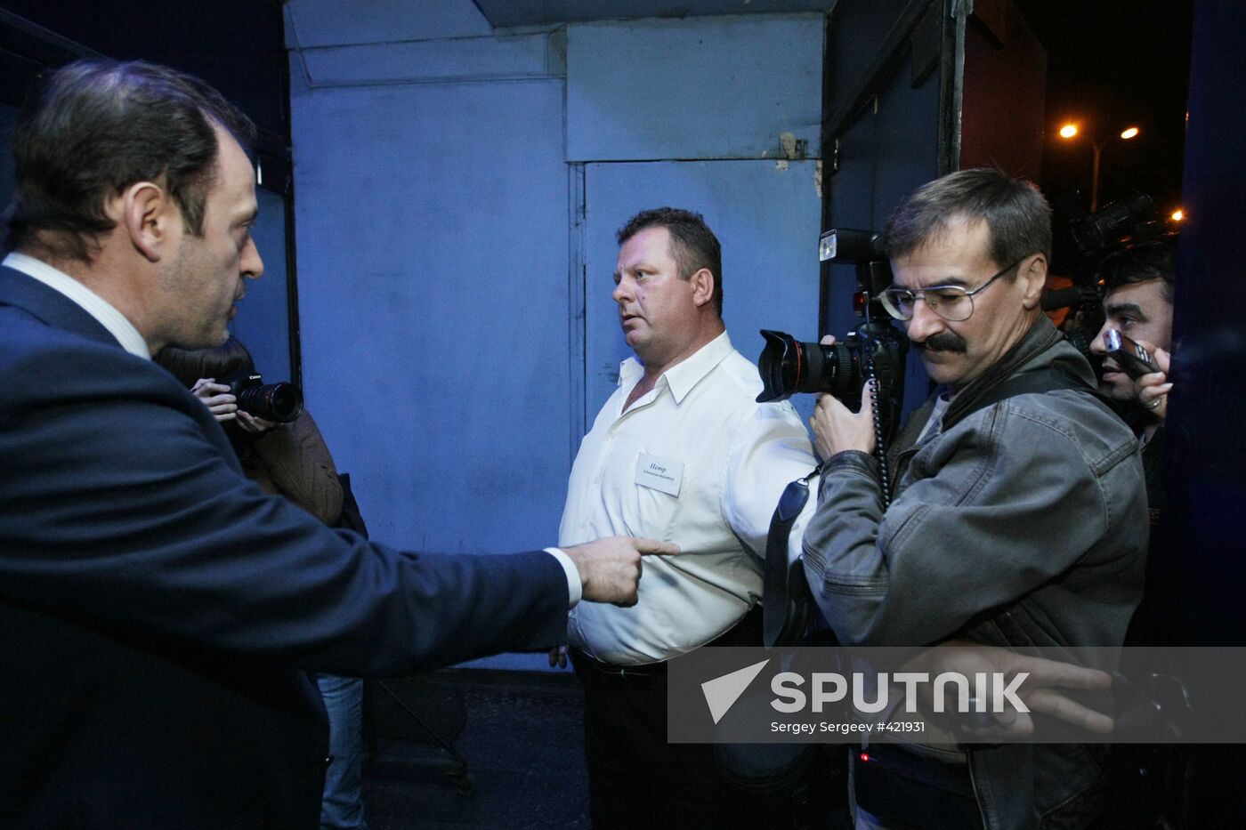 Oleg Mitvol takes part in police raid at gay club