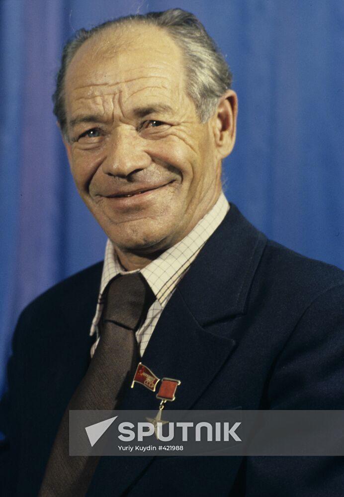 Tractor driver Ivan Ivanov of "New Road" Soviet farm