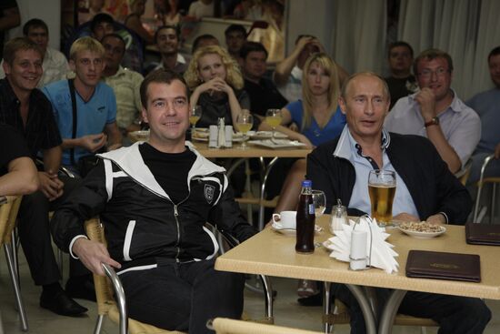 Dmitry Medvedev and Vladimir Putin watching football broadcast