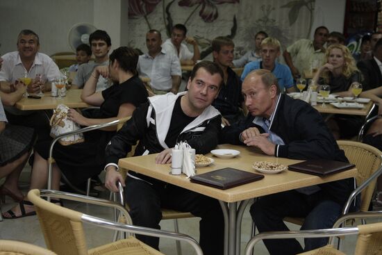 Dmitry Medvedev and Vladimir Putin watching football broadcast
