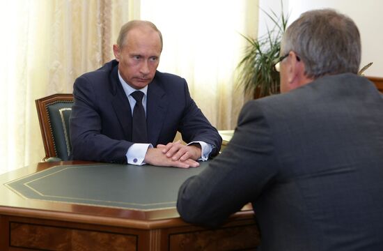 Vladimir Putin meets with Andrei Kostin