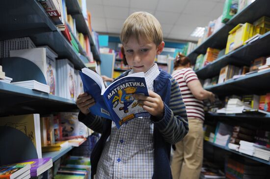 Purchasing textbooks at bookstore