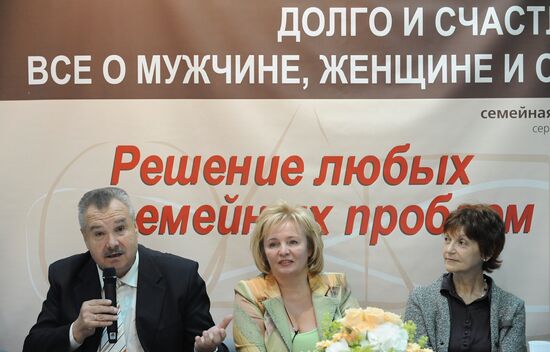 Lyudmila Putina, Alexander Kiselyov, and Olga Troitskaya