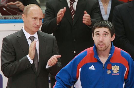 Vladimir Putin at Russian hockey players' training session