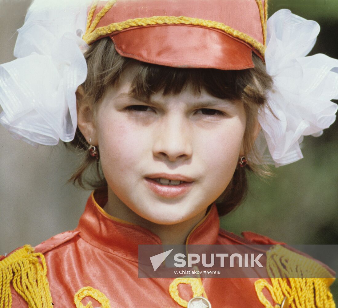 Schoolgirl wearing Hussar's costume