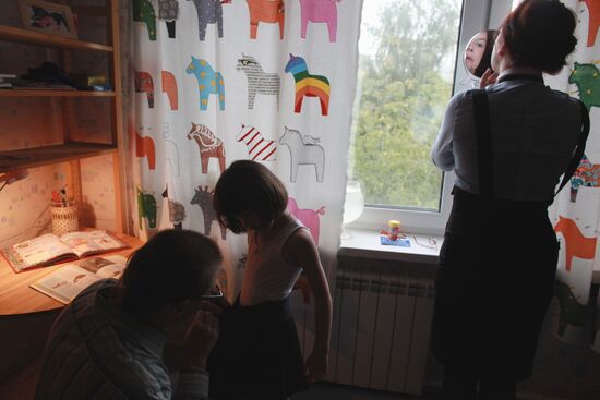 First grader getting ready for school