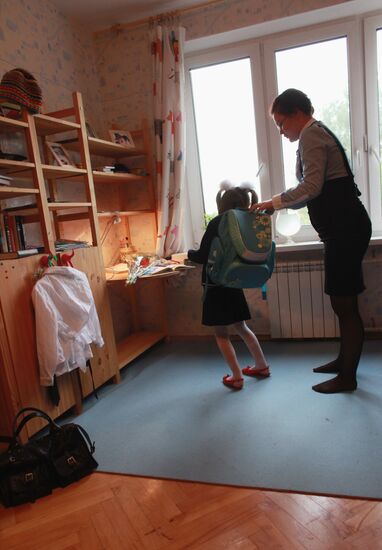 First grader getting ready for school