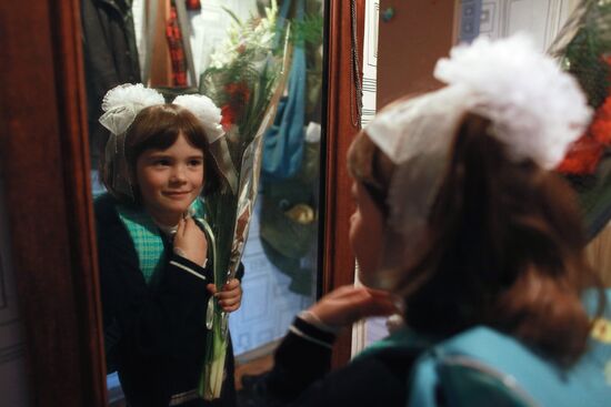 First grader getting ready for school