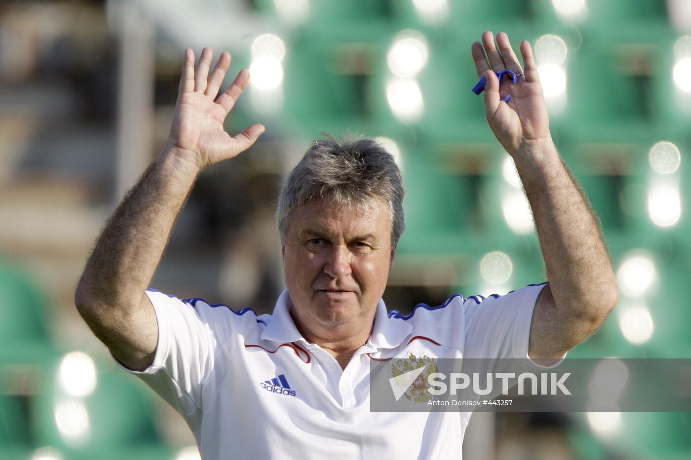 Guus Hiddink attends open training session
