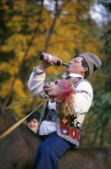 Horseman with a bottle of wine