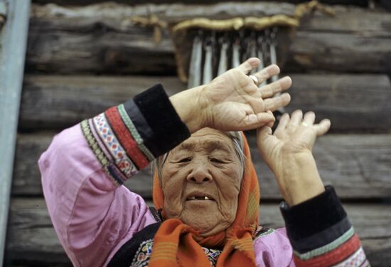 Nanai woman in traditional clothes