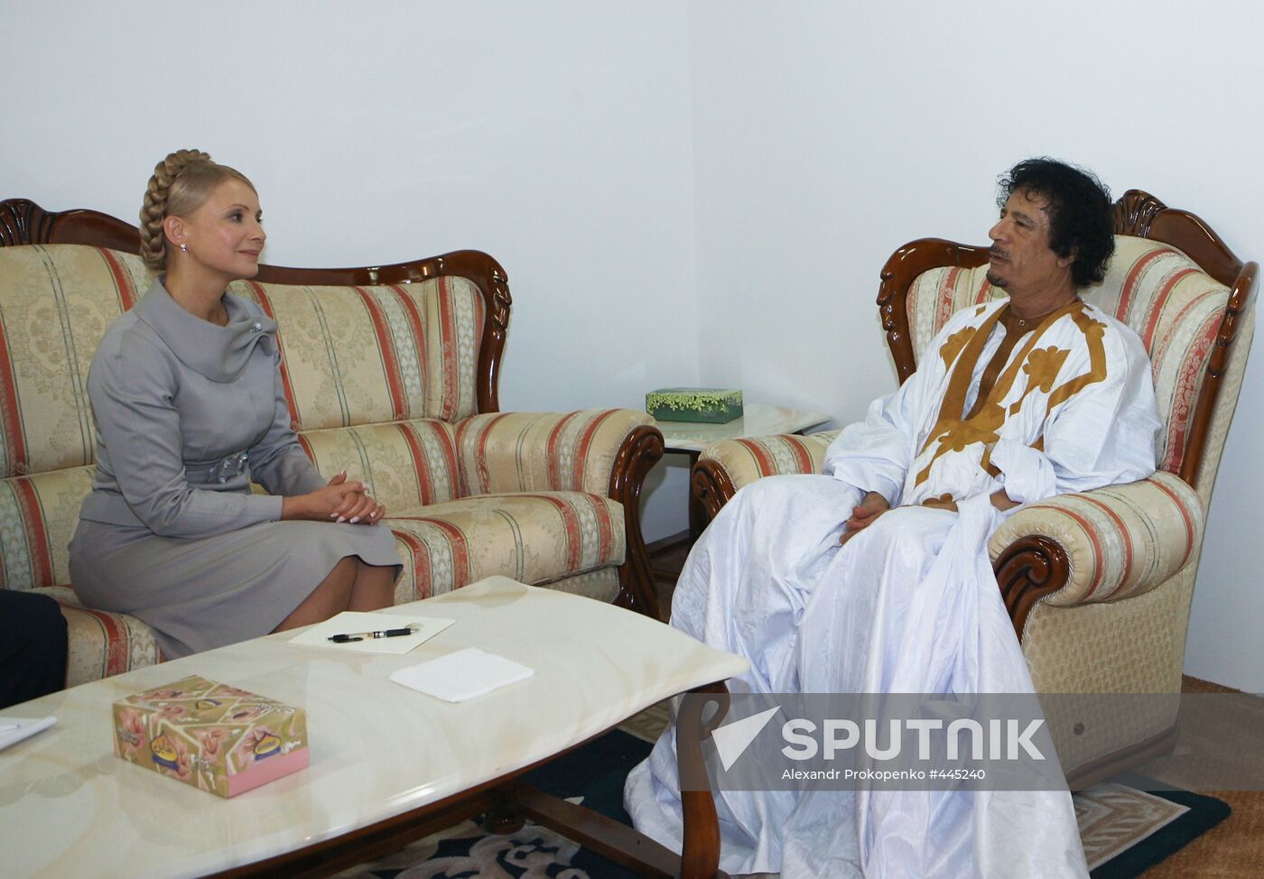 Yulia Tymoshenko and Muammar Qaddafi