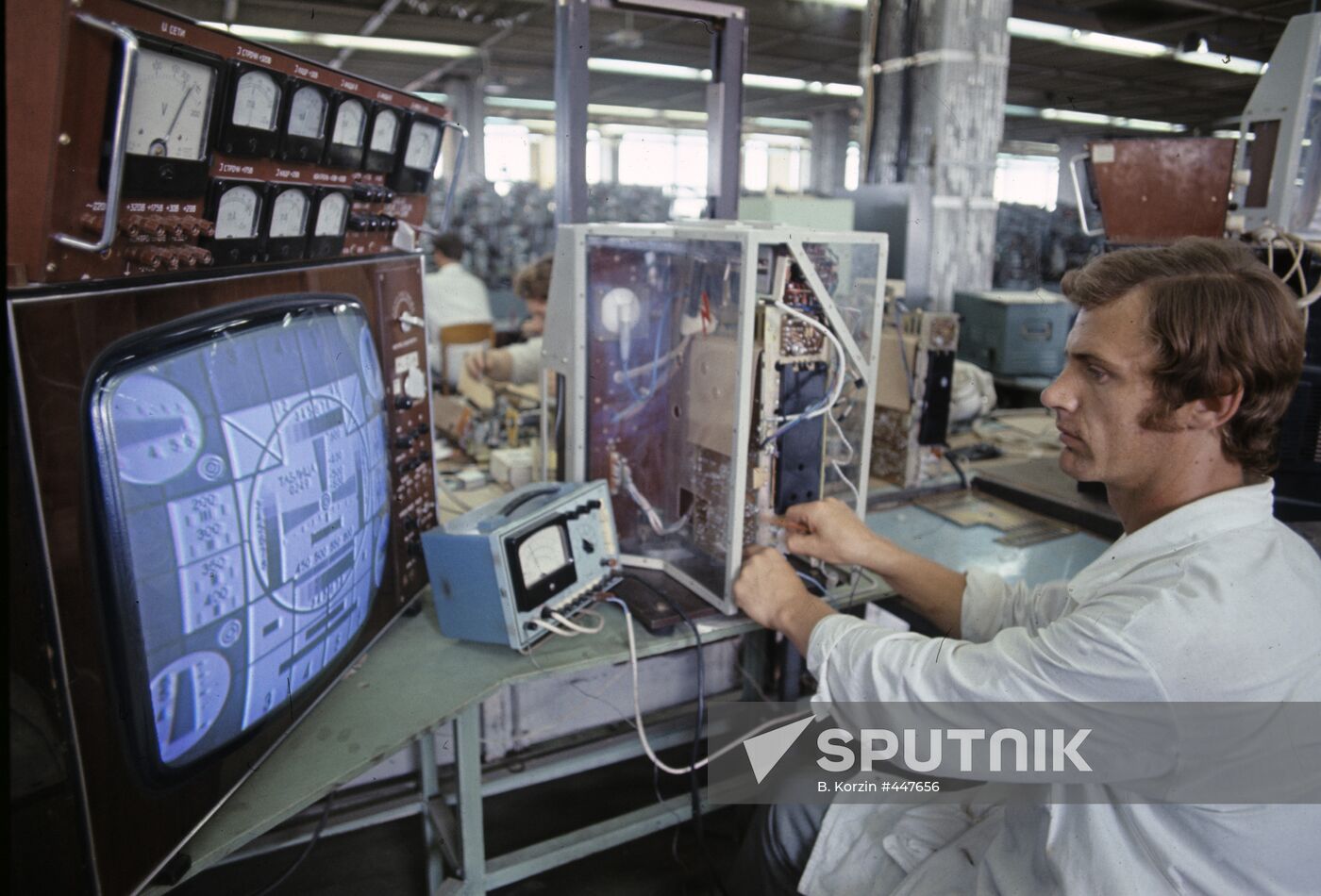 Adjusting TV sets at Moscow-based Temp radio plant