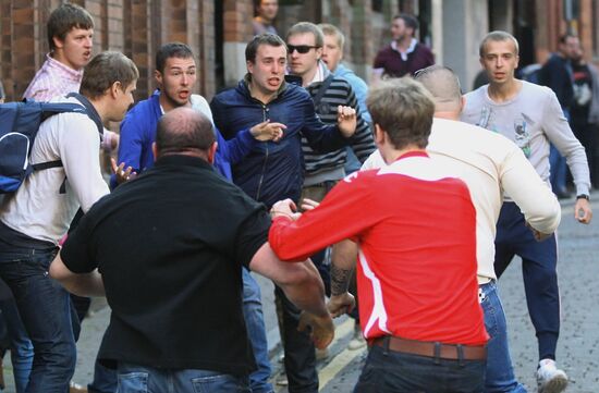 Football fans clash at Cardiff's Millennium Stadium