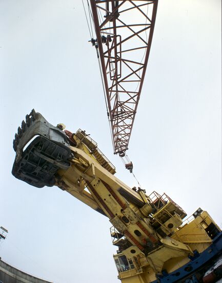 Excavator inside Neryungri coal strip mine