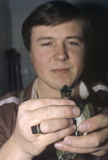 Gem cutter M.Orlov holding 37 carat emerald