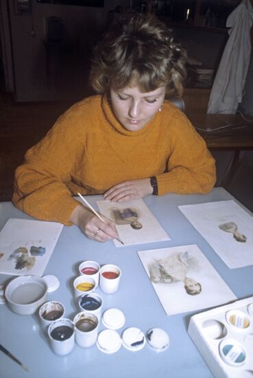 Restorer of ancient women's portrait
