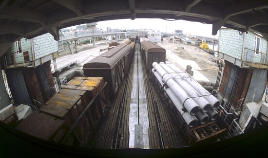 Freight cars loaded aboard diesel-electric ship