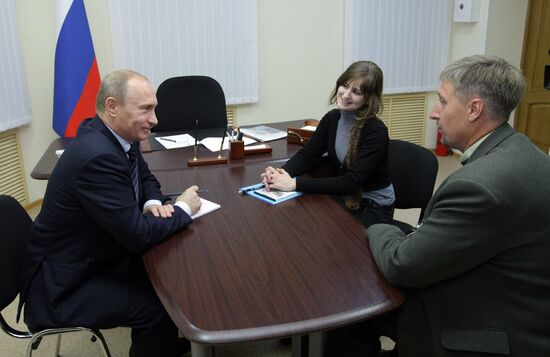 Vladimir Putin meets with citizens at United Russia office