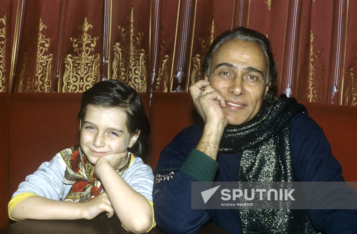 Nikolai Slichenko with his grandson