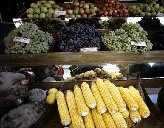 Stand with fruit, vegetables and berries