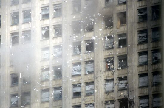 Smoke billowing from windows