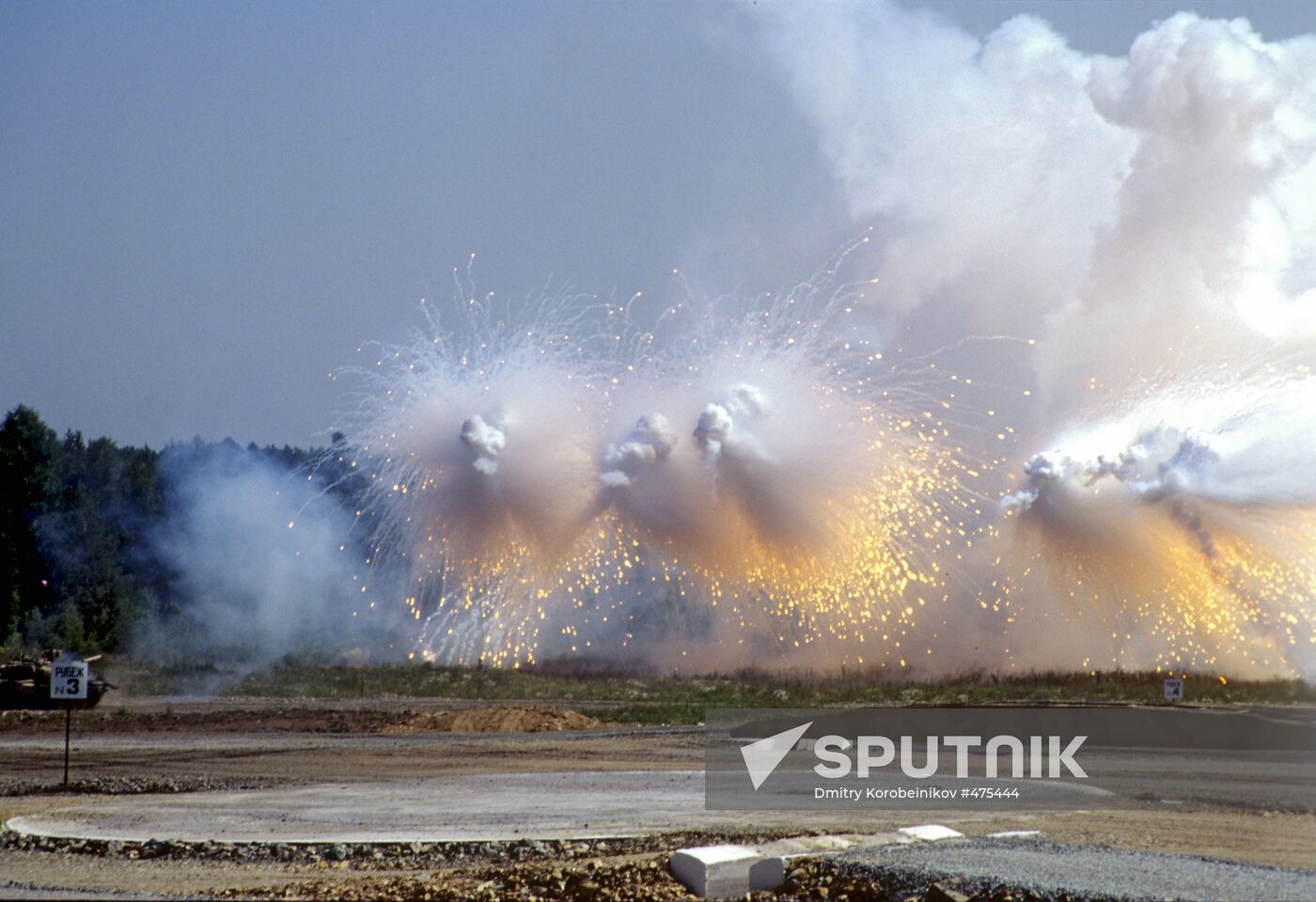 Tanks fire smoke grenades