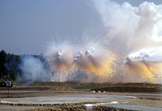 Tanks fire smoke grenades